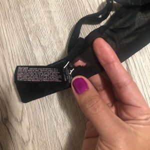Black VS bra mesh with small tear